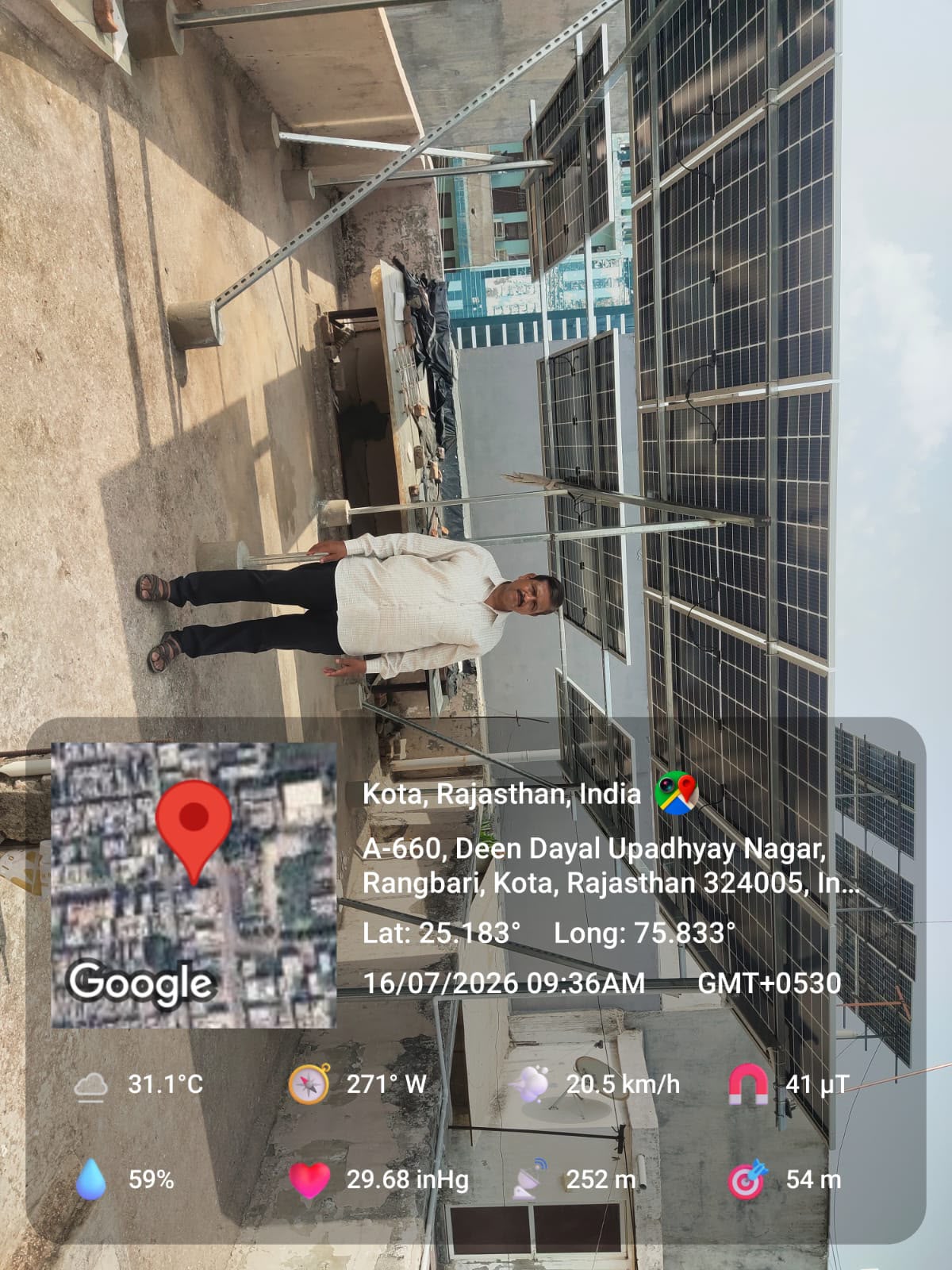 Completed rooftop solar array with customer standing beneath the mounted panels