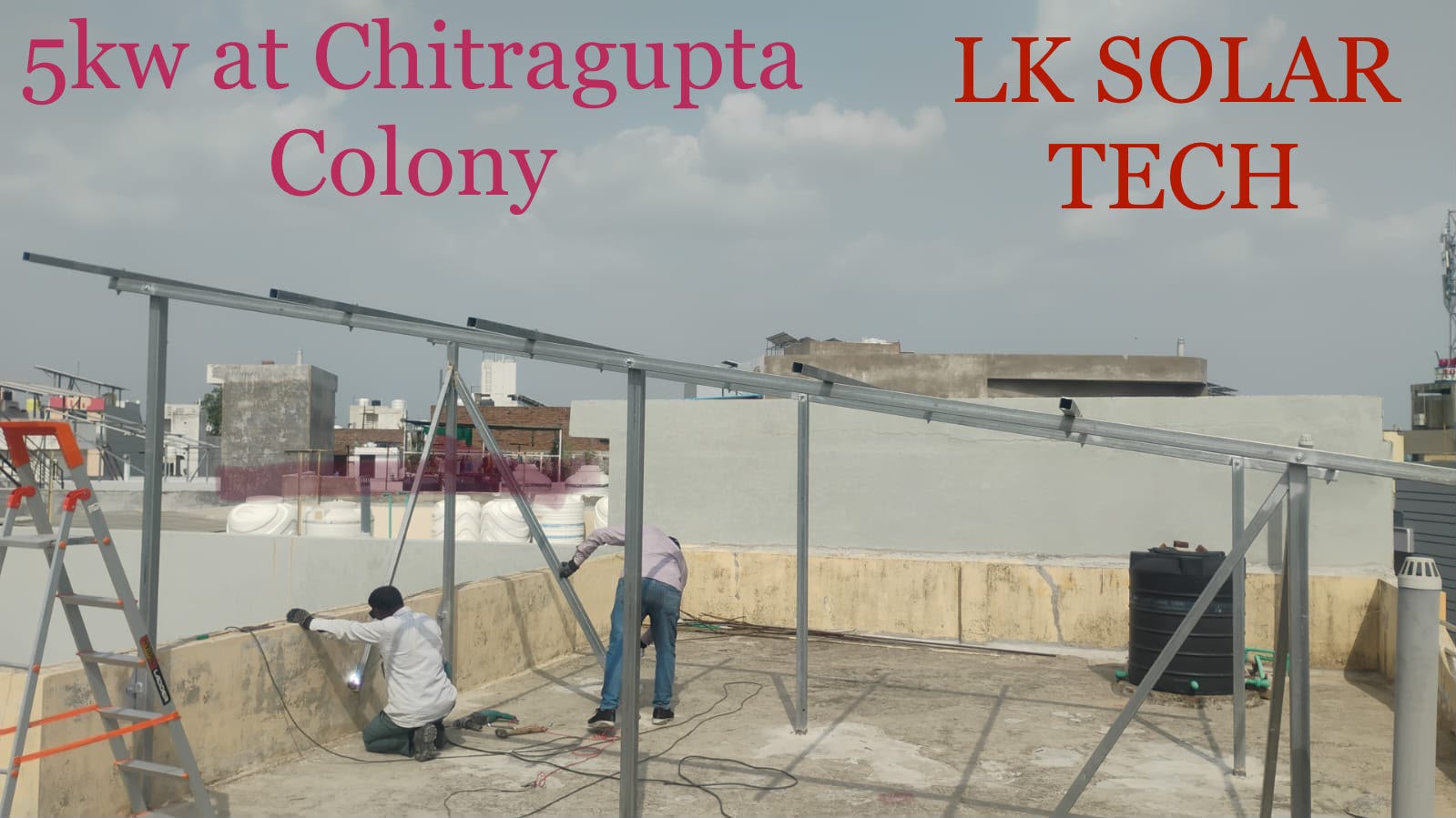 Technicians assembling a 5 kW rooftop mounting structure